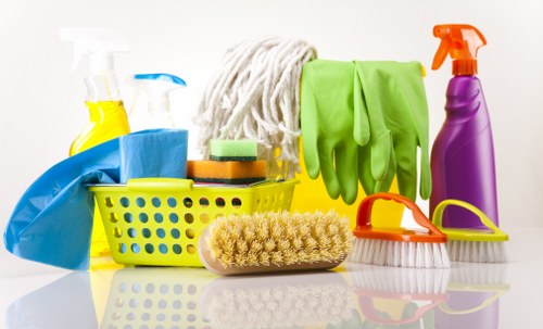 Carpet cleaning technician preparing equipment with safety focus